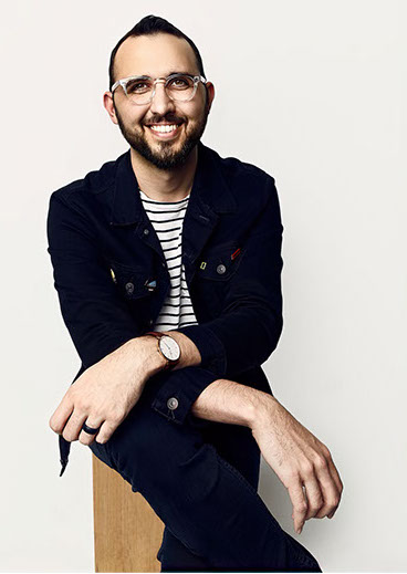 Portrait of Class of 2013 Student Alum and Graphic Designer Corey McClelland. Corey is a juror for Polykrama 2021.